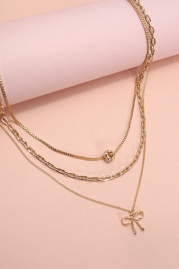 MULTI LAYER PEARL BOW CAHRM NECKLACE | 80N605
