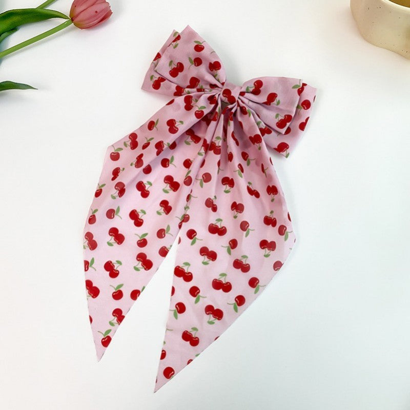 TRENDING CHERRY ON A PINK BOW RIBBON HAIR CLIPS | 40H904