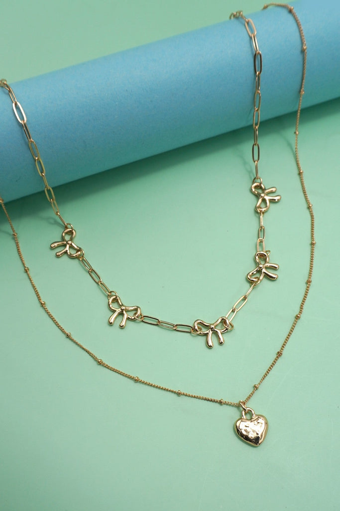 DOUBLE LAYER MULTI BOW WITH HEART CHARM NECKLACE | 80N91660