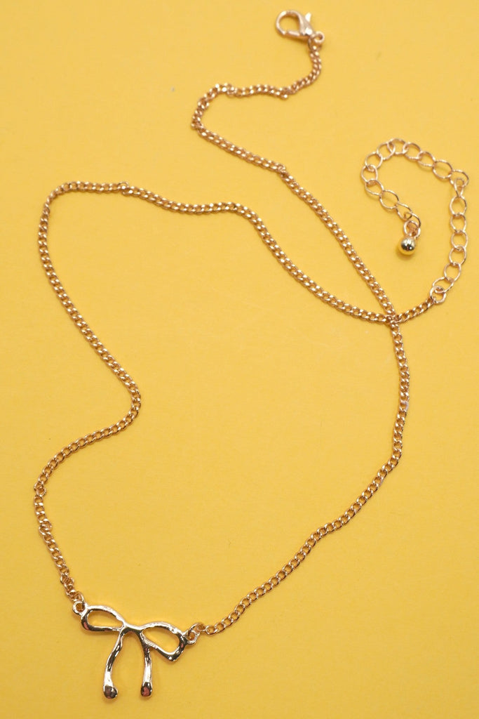 CLASSIC HAMMERED BOW NECKLACE | 31N50532