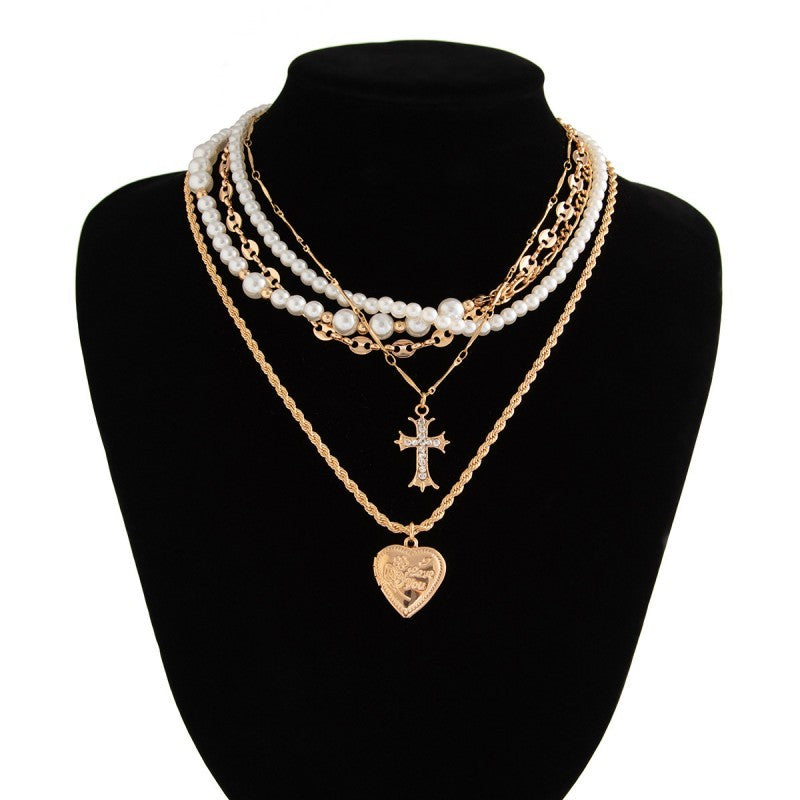 CROSS HEART CHARM MULTILAYER PEARL NECKLACE | 40NK9457