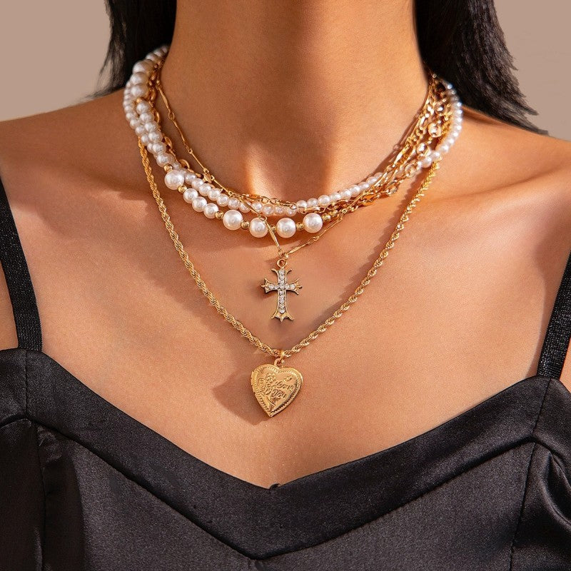 CROSS HEART CHARM MULTILAYER PEARL NECKLACE | 40NK9457
