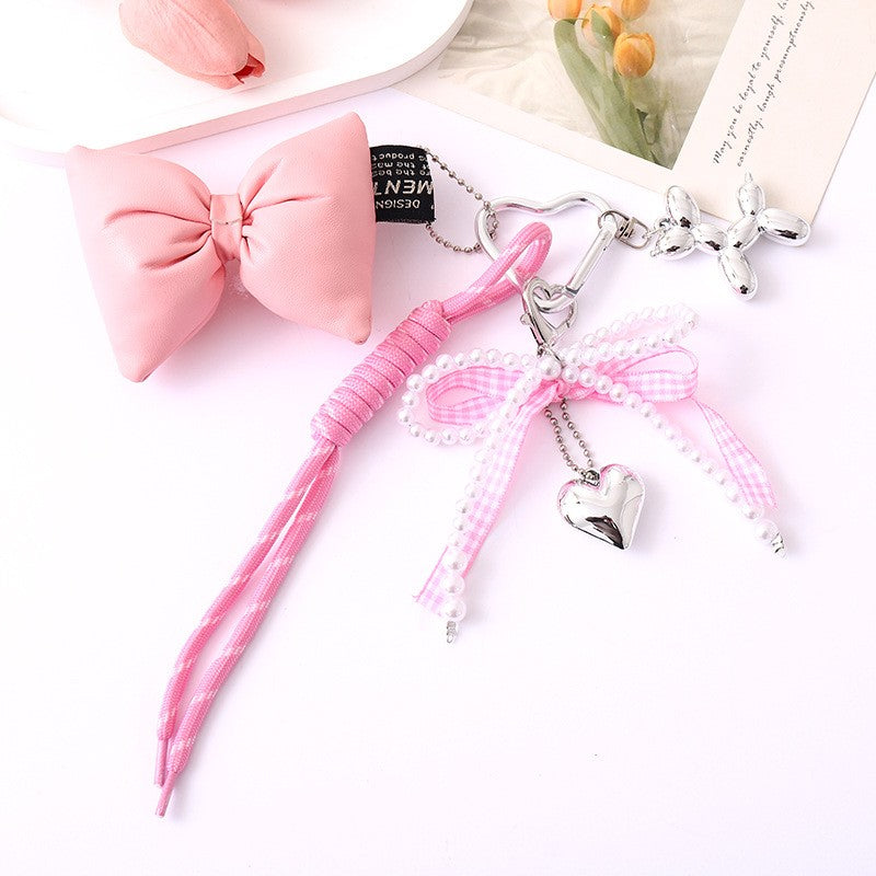 TRENDING PUFFY BOW ROPE PEARL BAG CHARM KEYCHAIN | 40KC158