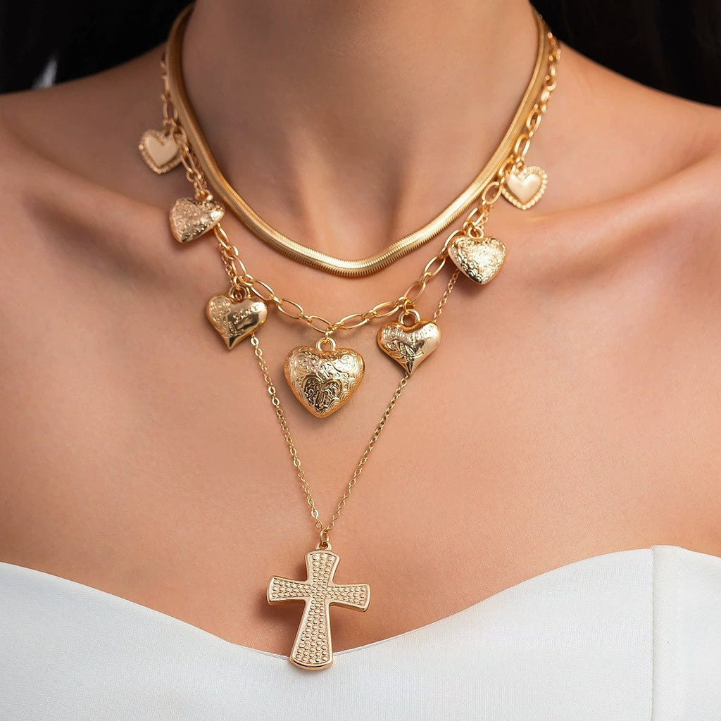 MULTI LAYERED CROSS MULTI HEART CHARM NECKLACE | 40NK9473