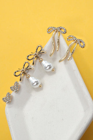 RHINESTONE HEART BOW PEARL DROP BOW EARRINGS | 80E6698