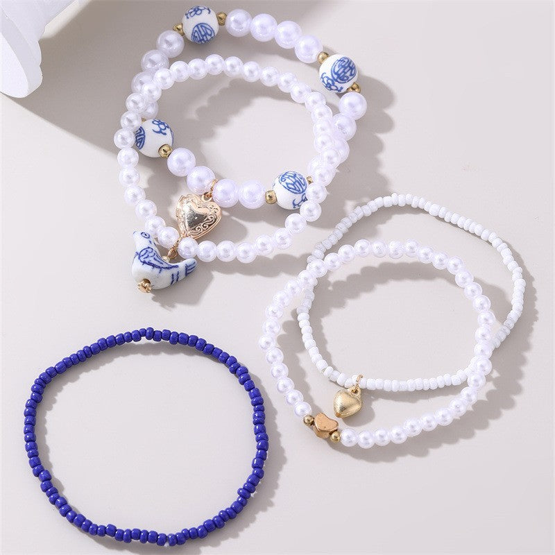 BLUE CERAMIC PORCELAIN BOW MULTI LAYER BRACELET | 40B5164
