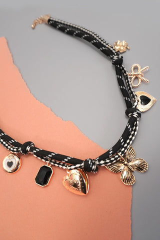 DOUBLE CORD CHARM NECKLACE - HEART LOCKET CLOVER | 80N92317