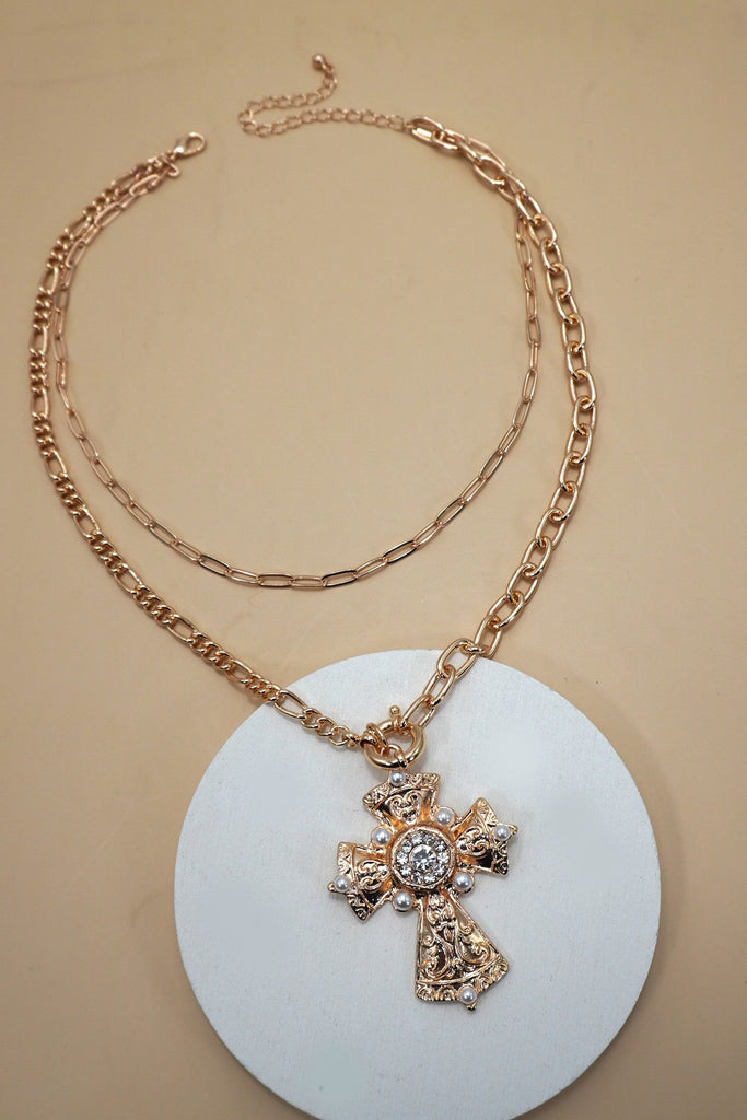 MULTI LAYERED CROSS STATEMENT NECKLACE | 80N92465