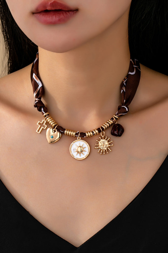 CHARM NECKLACE-SUN HEART CROSS TORT | 80N92528