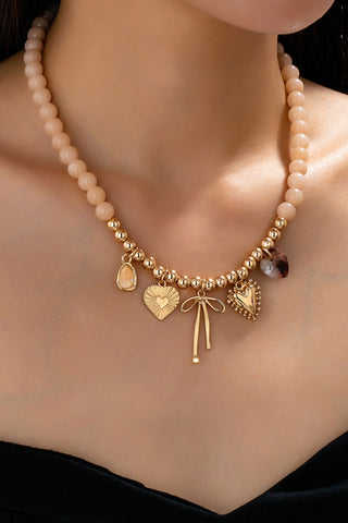 Beige Beaded Bow Heart Rhinestone Charm Necklace | 80N92689
