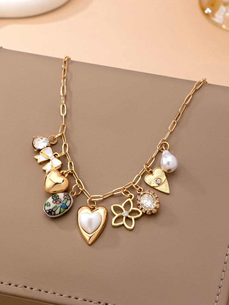Charm Necklace-Charming Heart Bow & Pearl Dangle | 80N92810