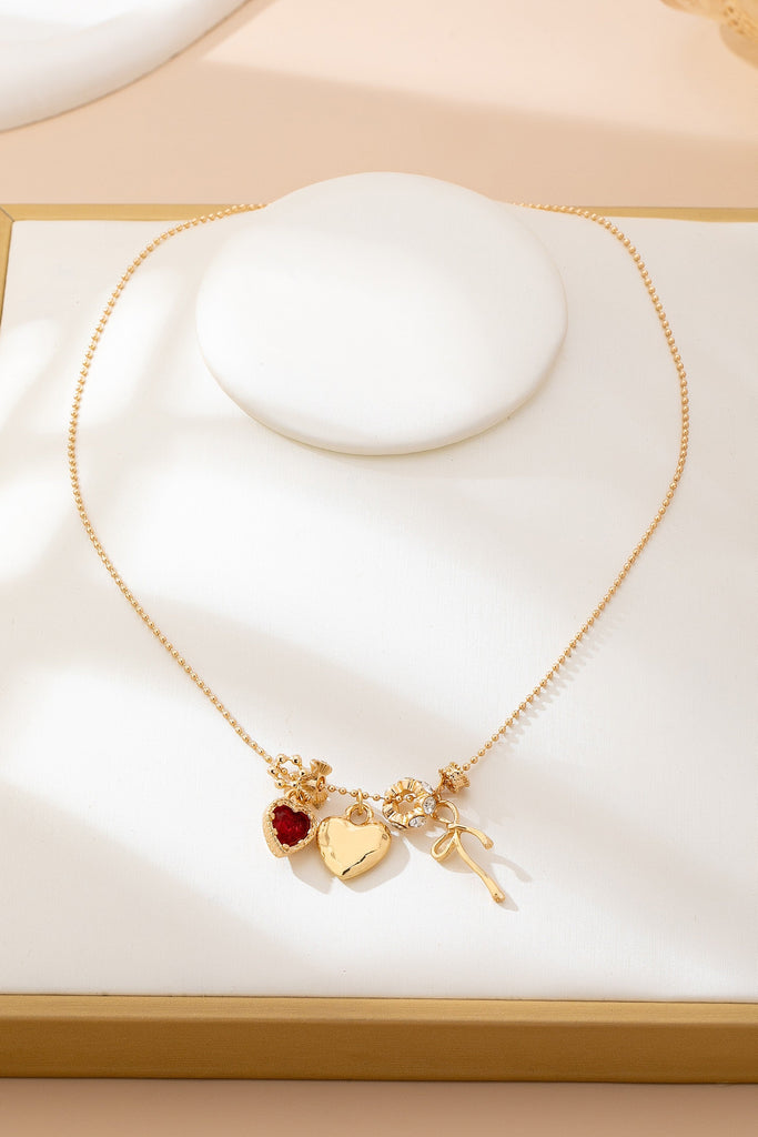 Multi-Charm Heart and Bow Necklace | 80N92882