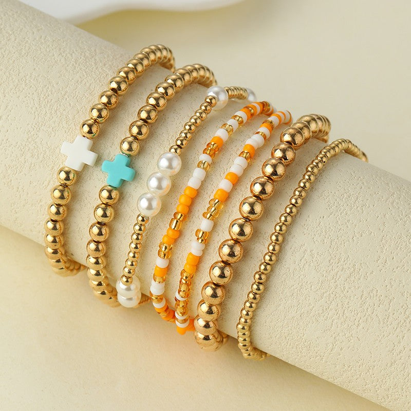 MULTI BALL PEARL BEAD CROSS STRETCHABLE BRACELET | 40B5271