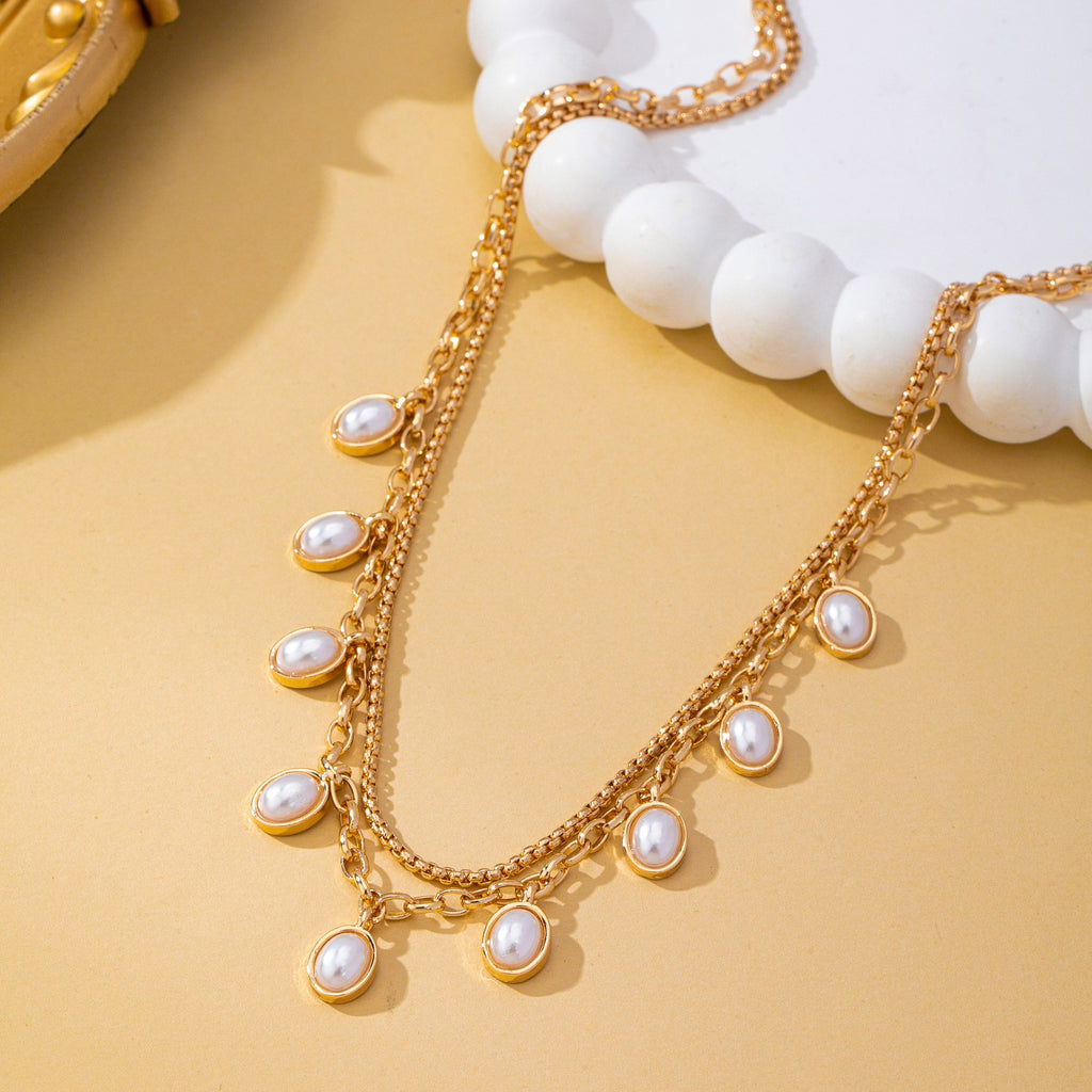 Layered Gold Chain Pearl Charm Necklace | 80N93660