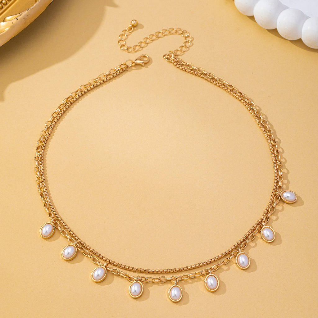 Layered Gold Chain Pearl Charm Necklace | 80N93660