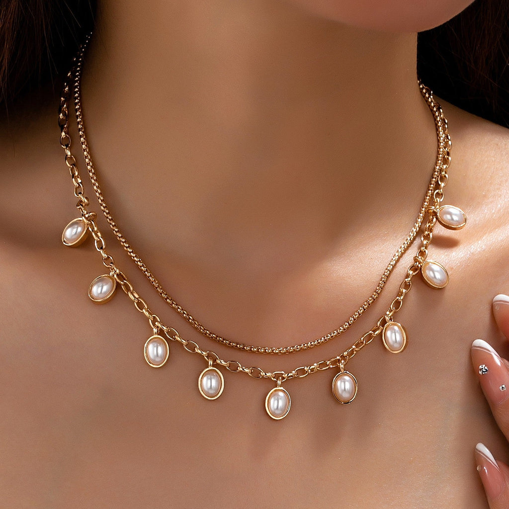 Layered Gold Chain Pearl Charm Necklace | 80N93660