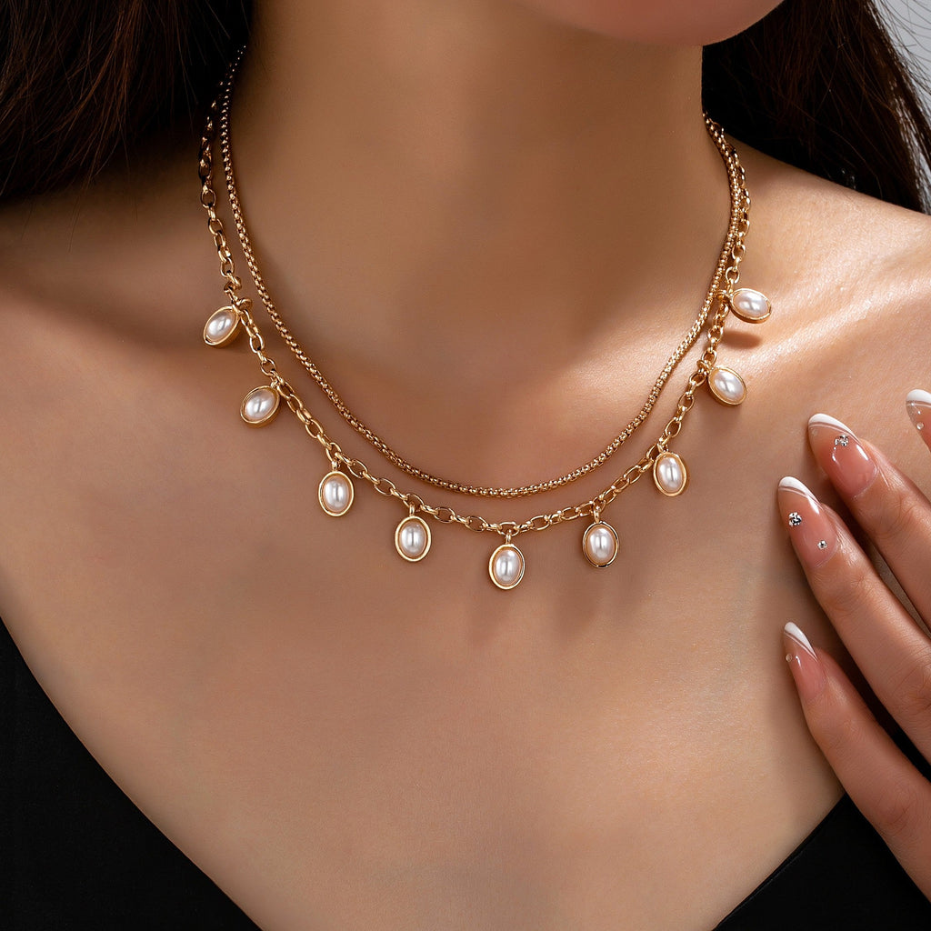 Layered Gold Chain Pearl Charm Necklace | 80N93660