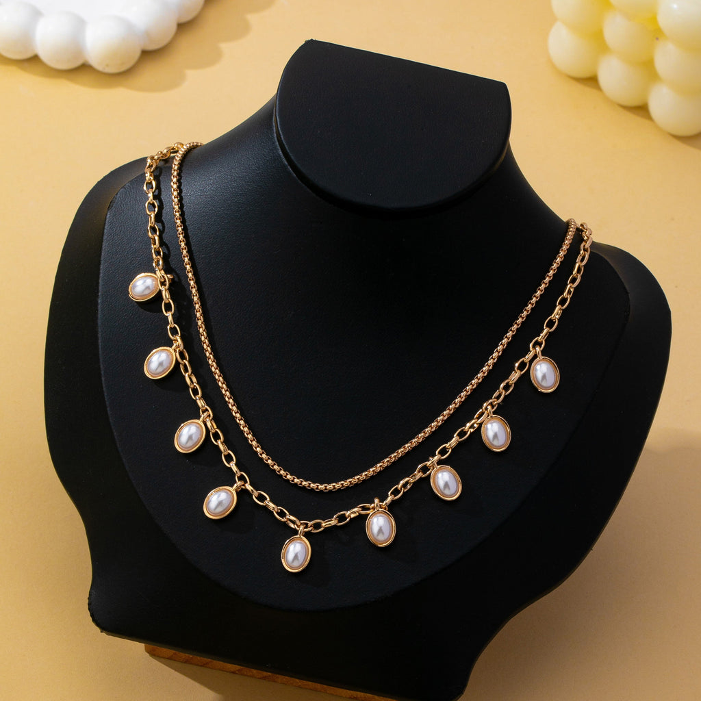 Layered Gold Chain Pearl Charm Necklace | 80N93660